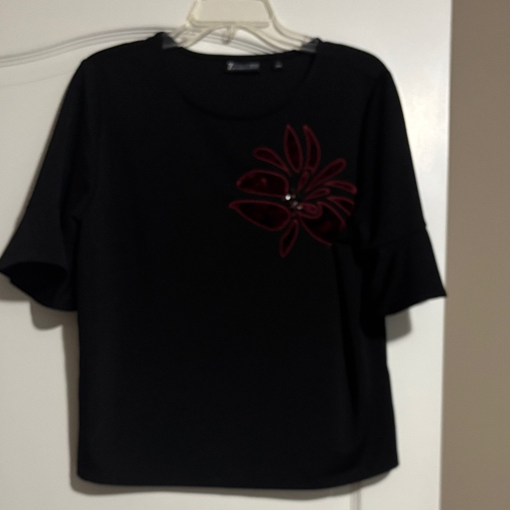 Chic Black Blouse with Red Floral Detail